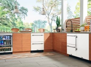 tan kitchen set with refrigeration abilities